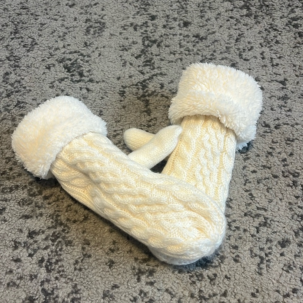 Knit white mittens